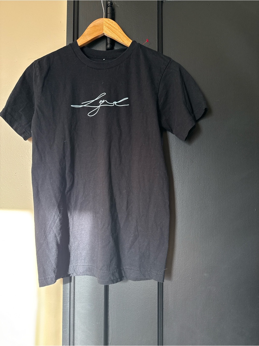 Black Short-Sleeve Tee with White Script Logo